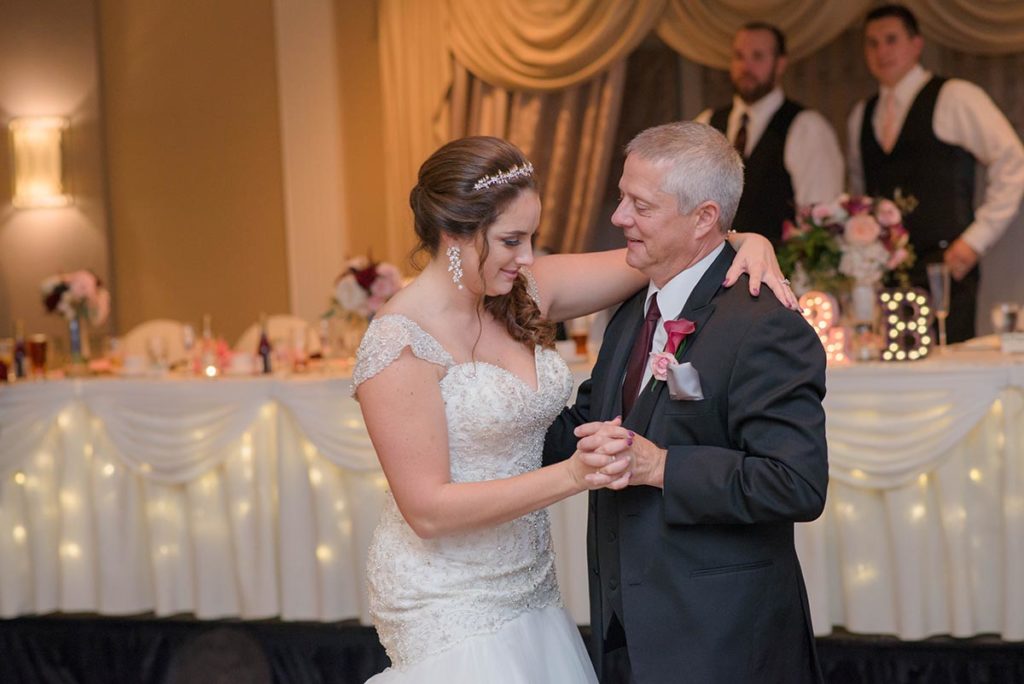 bride dances with her dad