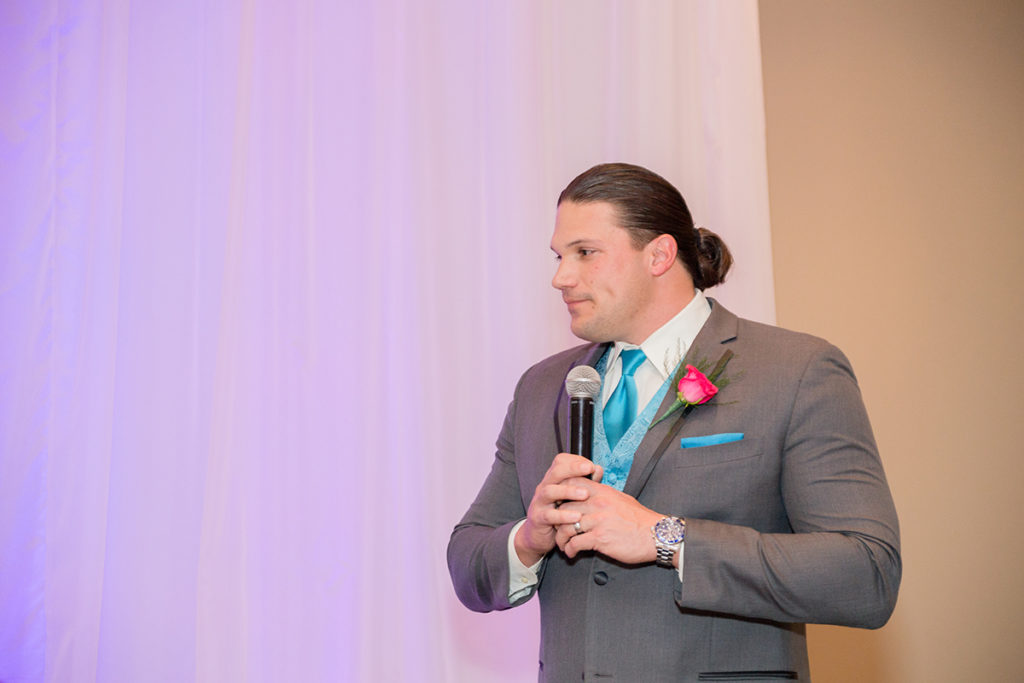 groom's brother gives best man speech at wedding