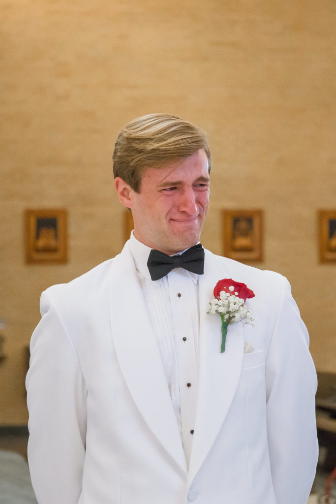 groom cries when he sees his bride walking down the aisle